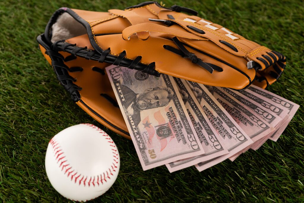 dollar banknotes in baseball glove near ball on gr 2021 09 21 23 34 31 utc 1 1